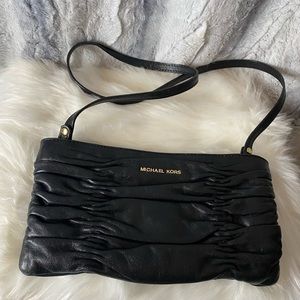 Micheal Kors small purse. Black and great condition
